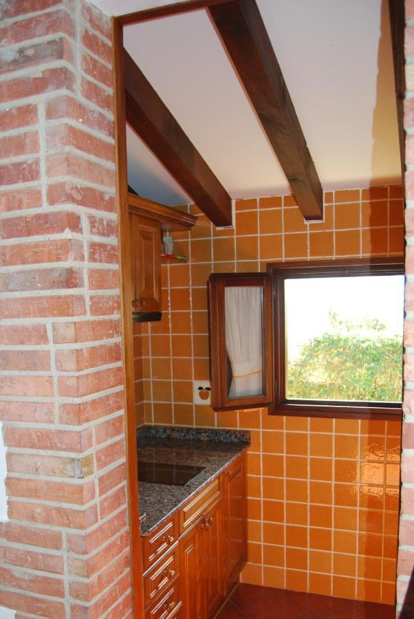 Apartamentos El Perujo Комильяс Экстерьер фото